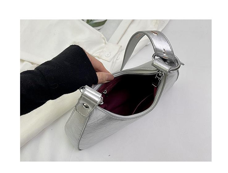 Retro burst pattern texture hand -lifted small bag